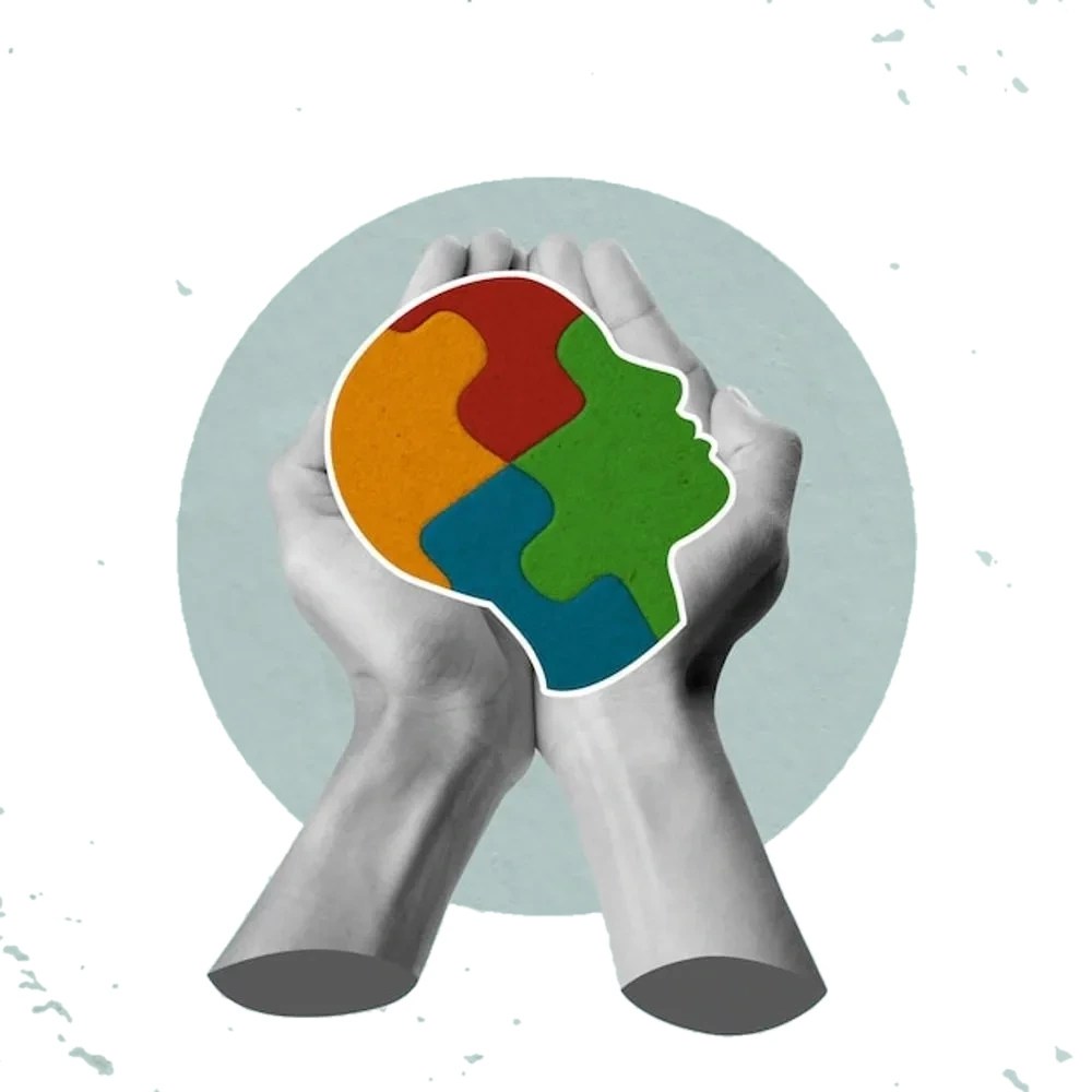 Collage of two hands cradling a head-shaped jigsaw of colours
